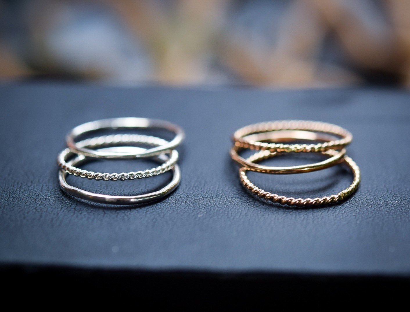 Stacking rings, sterling stack on the left, gold-filled stack on the right.
